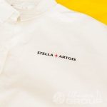 Перенос надписи «Stella Artois» на женские платья